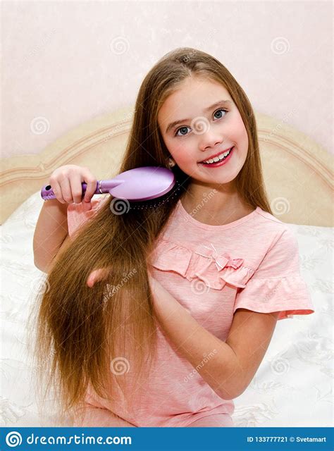 Portrait Of Cute Smiling Little Girl Child Brushing Her Hair Stock Image - Image of closeup ...