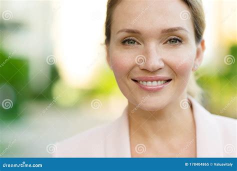 Close Up Portrait Of A Smiling Woman On The Street Happy Woman`s Face Closeup Outdoors Stock
