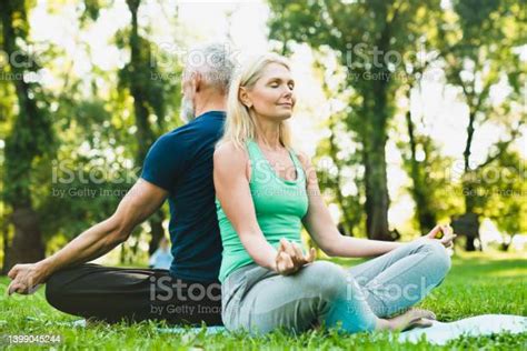 Meditation In Public Park Yoga Class For Mature Elderly People Mature