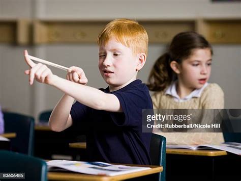 Child Misbehaving In Class Photos And Premium High Res Pictures Getty