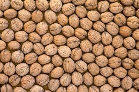 Premium Photo Walnuts Background Nuts Texture