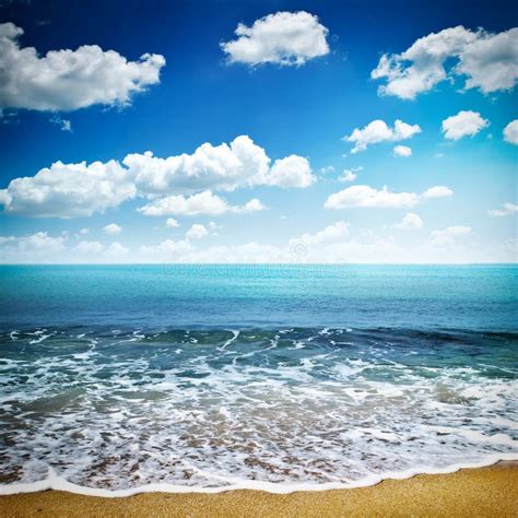 Sea View From Beach With Sunny Sky And Clouds Stock Image Image Of