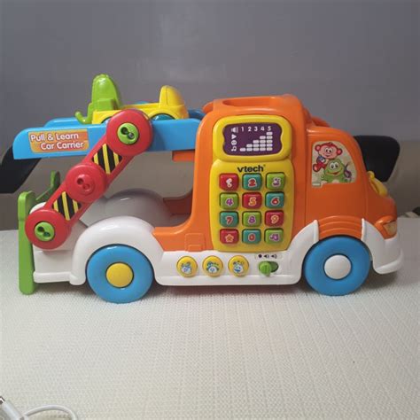 Vtech Pull And Learn Car Carrier With Free Toy Car With Lights And Sounds