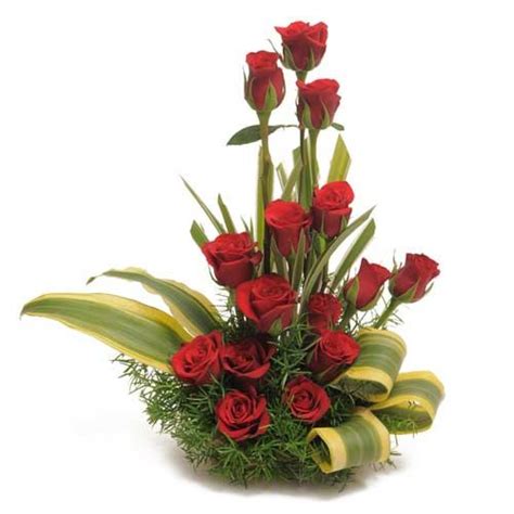 15 Red Roses And Exotic Leaves Arrangement J K Florist