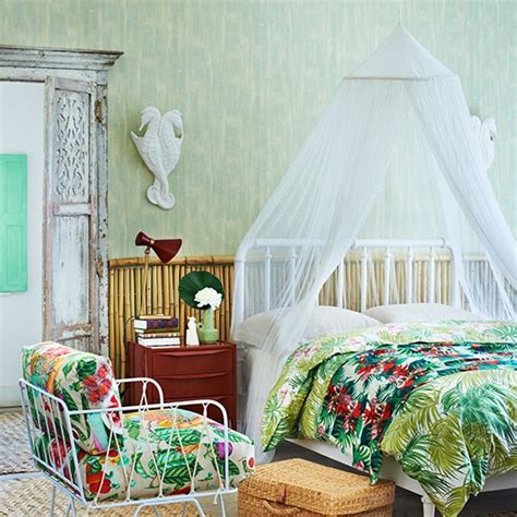 A modern tropical bedroom should exude tranquillity and simplicity, where less is more. Green bedroom with tropical prints and cane panels ...