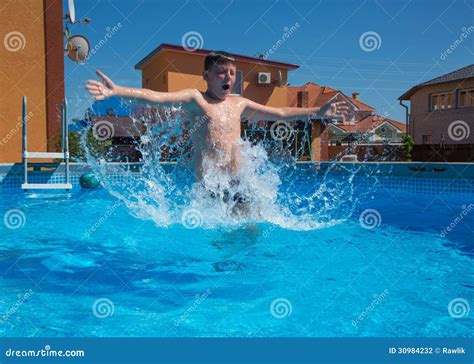 Boy Jumping In The Pool Stock Photo Image Of Student 30984232