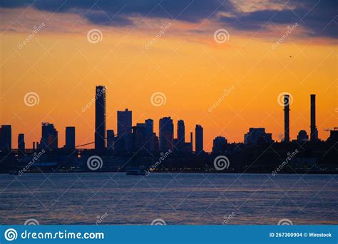Silhouette Of The Lower Manhattan Skyline On The East River In New York