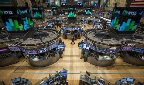 They also must wear masks. Goldman Sachs sell New York Stock Exchange floor market