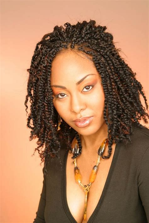 Get this look by putting your hair into big flat twists at night. Inspiring 12 Twist Styles on Natural Hair | New Natural Hairstyles