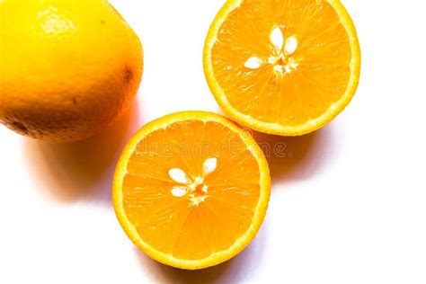 Top View Of Two Halves Of Orange On White Background Stock Photo