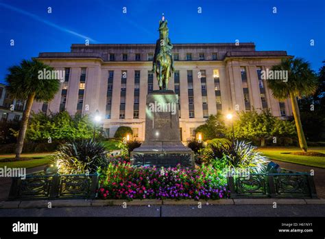 Statue And Building At The State Capitol At Night In Columbia South