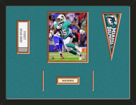 One Framed 8 X 10 Inch Miami Dolphins Photo Of Davone Bess With A Miami