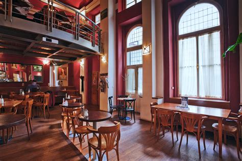 An internet café (also known as a cybercafé) is a café (or a convenience store or a fully dedicated internet access business) that provides internet access to the public. Globe Bookstore & Café - Prague.eu