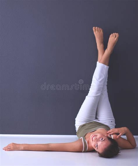 Woman Lying On The Floor With Legs Up Stock Image Image Of Home Legs 231467933