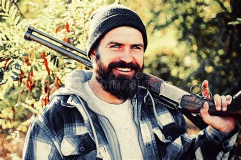 Pictures For Barbershop Bearded Hunter Man Holding Gun And Smile