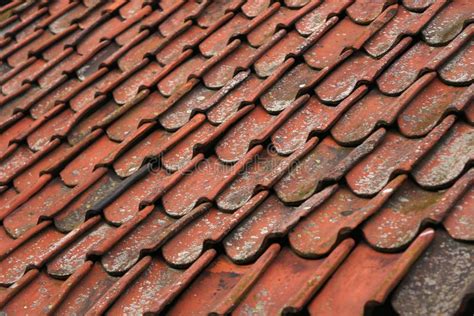 Closeup Of Old Red Clay Roof Tiles For Backgrounds Or Textures Stock