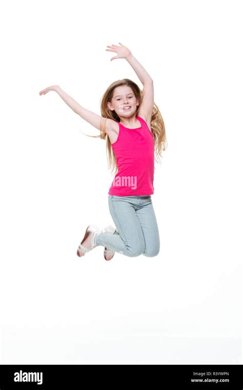 Happy Little Girl Jumping Stock Photo Alamy