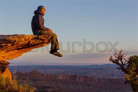 Man On The Cliff Stock Image Colourbox
