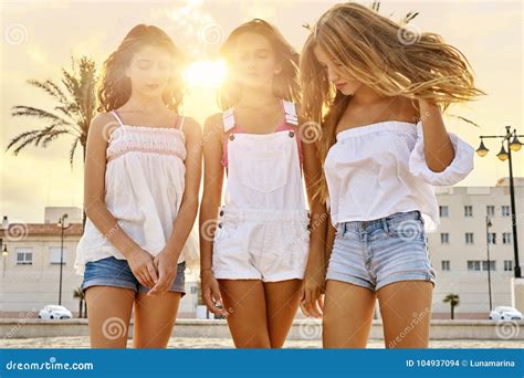 Best Friends Teen Girls Fun In A Beach Sunset Stock Photo Image Of