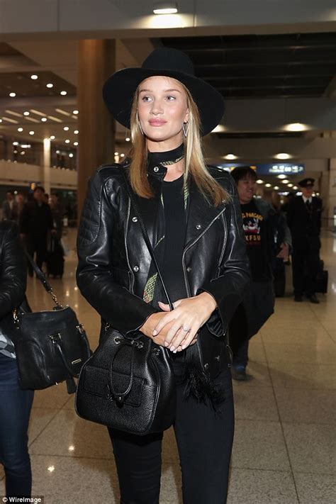 Rosie Huntington Whiteley Displays Bump In Seoul Daily Mail Online
