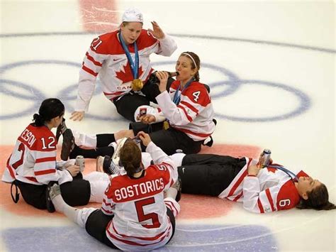 Team Canada Women At Centre Ice Celebrating A Gold Medal Win Hockeygods