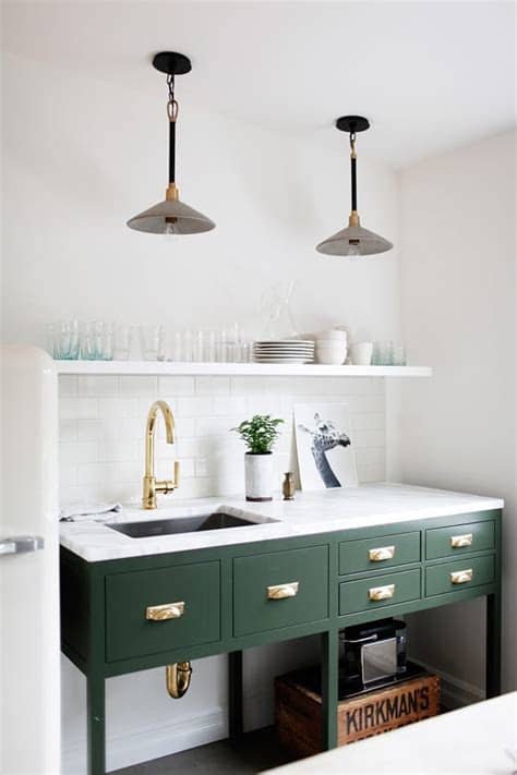 Sage green units will make a design statement without being overbearing. Green Kitchen Cabinet Inspiration - Bless'er House