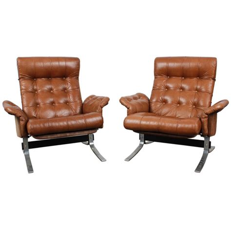Giantex mid century lounge chair with ottoman, leather 360 swivel chair w/ottoman, heavy duty aluminum base, modern recliner lounge chair &footrest set for office, living room (black) $479.99. Pair of Tufted Leather Danish Mid Century Modern Flat Bar ...