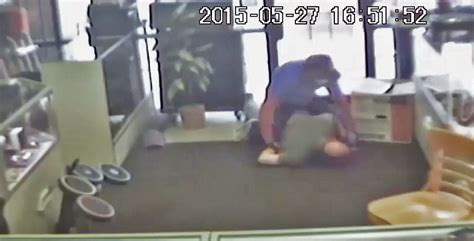 Police Release Video Of Robber Assaulting Clerk