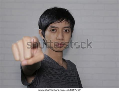 Handsome Indonesian Man Pointing Front Stock Photo 664312792 Shutterstock