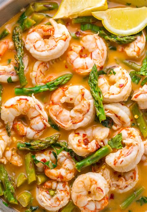 Stock up on frozen shrimp and you can make this luxurious tasting meal at moment's notice. Lemon Garlic Shrimp and Asparagus - Baker by Nature