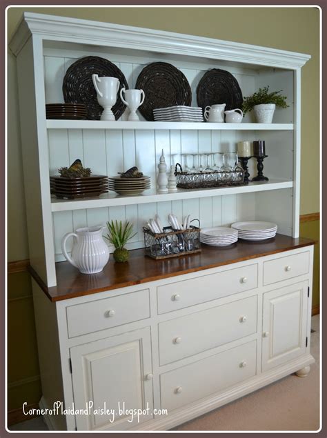 Spacious cabinets with adjustable shelves keep serving dishes or table décor close at hand, while three drawers store odds and ends with ease. Corner of Plaid and Paisley: Better Than a New Car - New ...