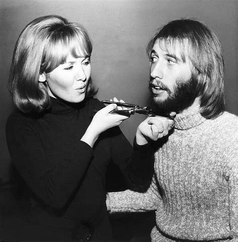 lulu singer giving husband maurice gibb of the bee gees a