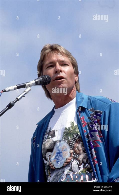 Singer John Denver Performs At An Earth Day Rally At The United States