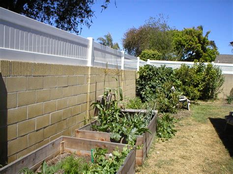 Vinyl does a very good job attaching to the top of a block wall. The