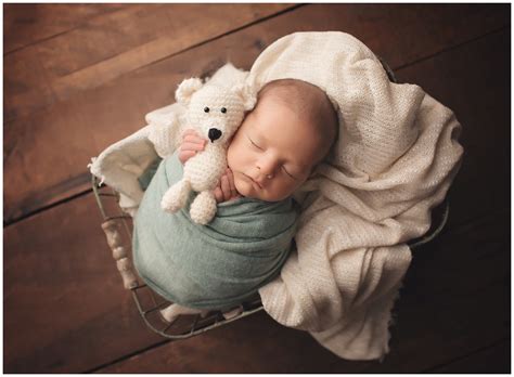 Stick to bathing your infant every other day or so to avoid drying out their skin, but keep wiping their face, neck, and diaper area. NJ Newborn Photographer- Newborn Baby Boy, NJ studio session