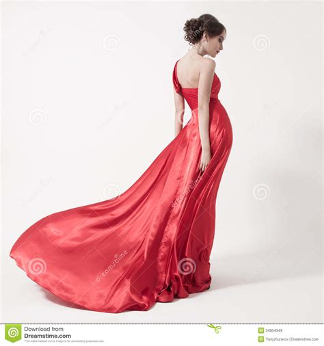 Young Beauty Woman In Fluttering Red Dress White