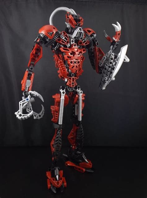 A Red And Black Robot Is Standing In The Dark