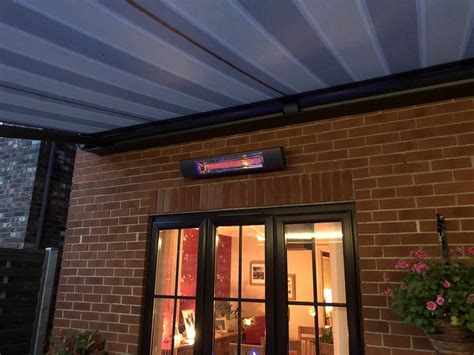 Large Electric Awning With Outdoor Heater Fitted In Southampton By