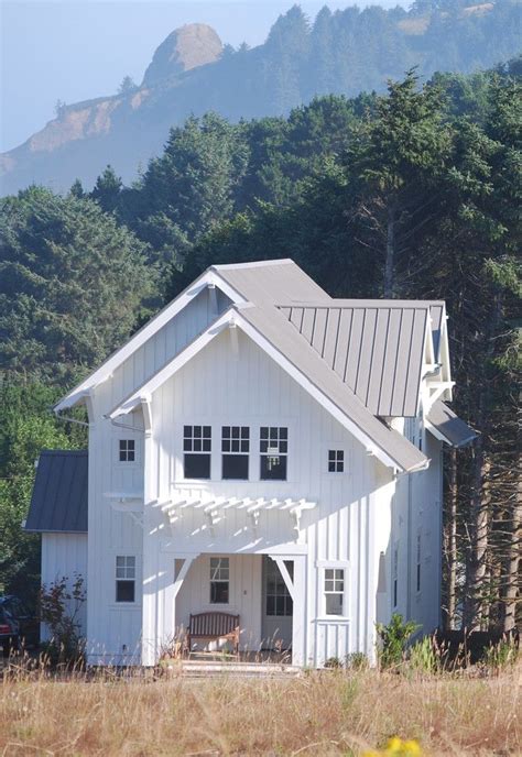 White House Brown Roof Exterior Farmhouse With Standing Seam Metal Roof