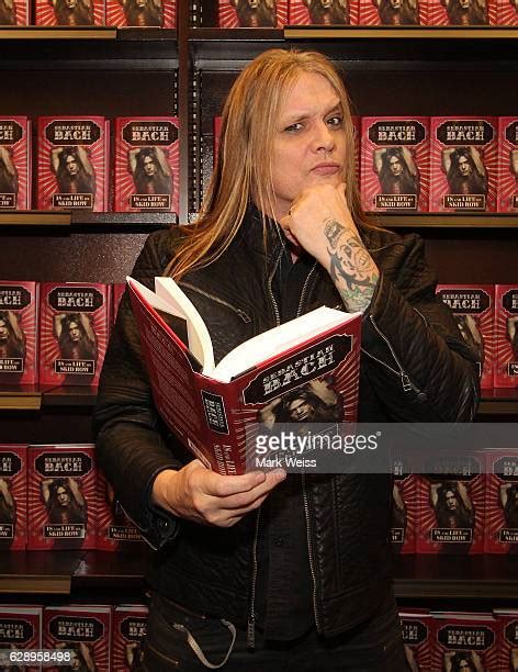 Sebastian Bach Signs Copies Of 18 And Life On Skid Row Photos And