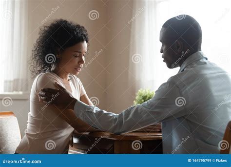 loving african american husband comfort sad wife stock image image of making american 164795799