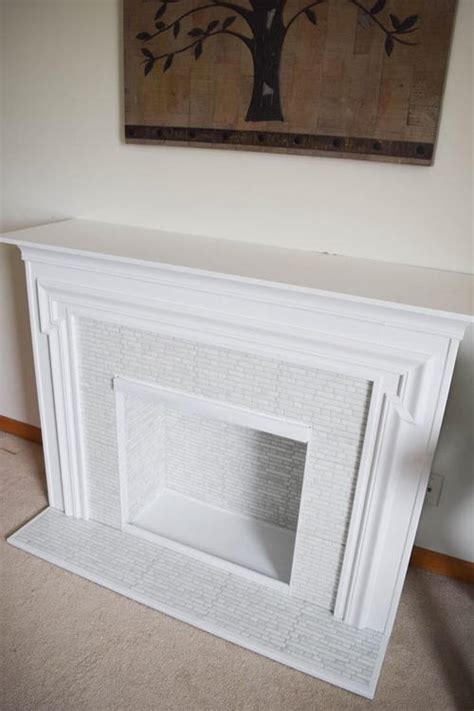 Maybe you would like to learn more about one of these? Fireplace surround makeover with peel and stick tile ...