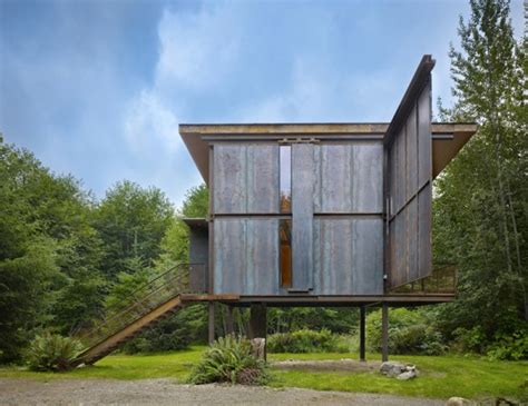 Since the cabin would be left uninhabited for weeks at a time steel shutters were used to completely. Steel Clad 350 Sq. Ft. Modern Cabin on Stilts with Shutters