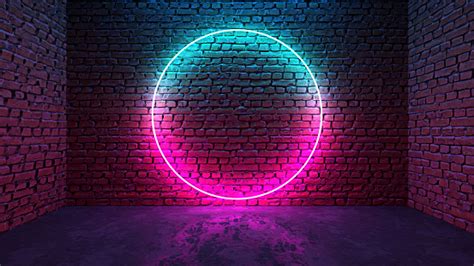 Circle Shaped Glowing Neon Frame On Brick Wall In Dark Room Stock Photo