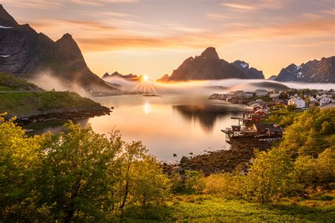 The official online armani boutique for the finest italian clothing, shoes, & many fashion and lifestyle items from the new collection. Norway Scenery Mountains Reine Fog Sun Bay