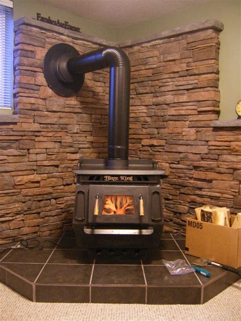 But installing a wood stove in the center of the room is not always possible because of furniture, obstacles or room design. photo of Wall behind wood-burning stove from a Kodiak ...