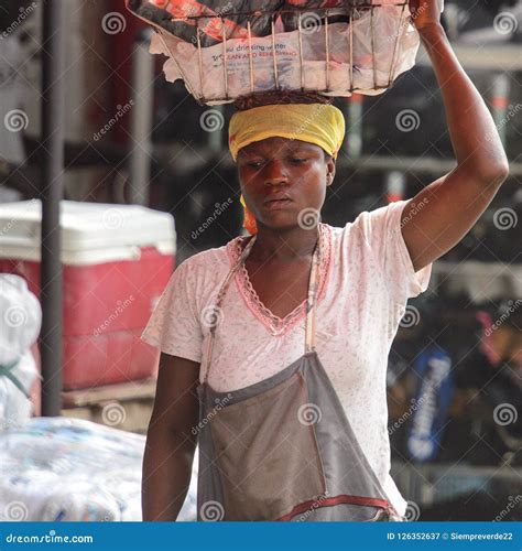 unidentified ghanaian woman carries a basket on her head editorial photography image of