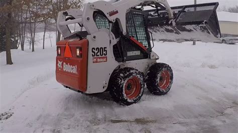 Bobcat Moving Snow In April Youtube