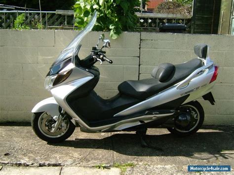 Łączy stylowe wzornictwo z wygodą i praktycznym podejściem. 2004 Suzuki burgman an 400 for Sale in United Kingdom