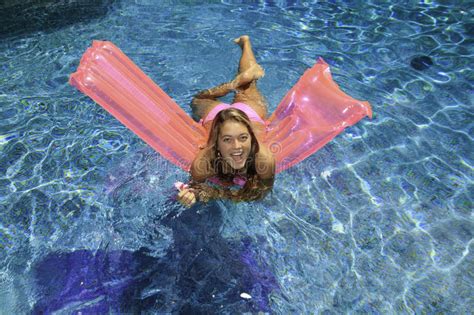 Teen Girl In Pink Bikini On A Float Stock Images Image
